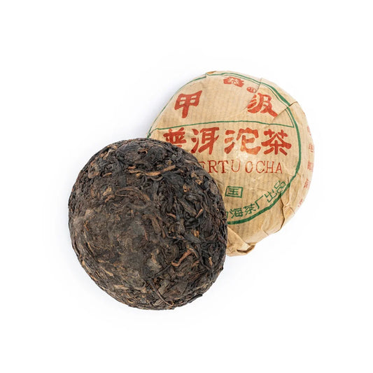 Pu-Erh Tuo Cha Kína fekete tea 95gr (Champion).